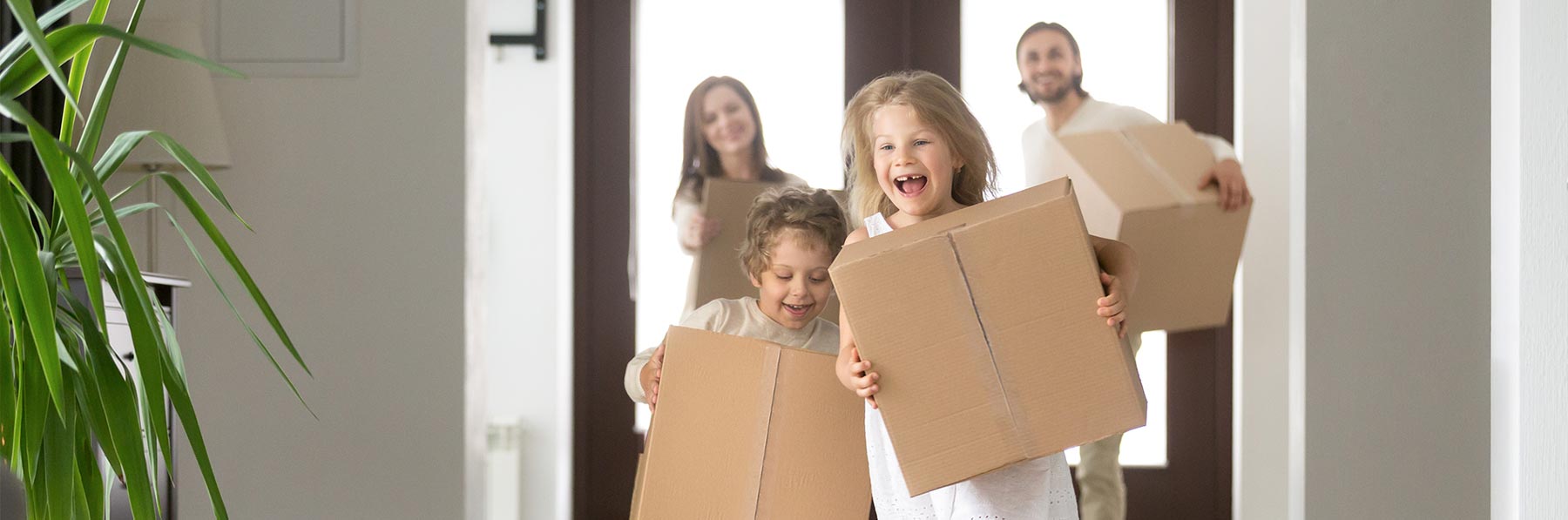Family moving into a home purchase with Your Home Sold Guaranteed Realty.